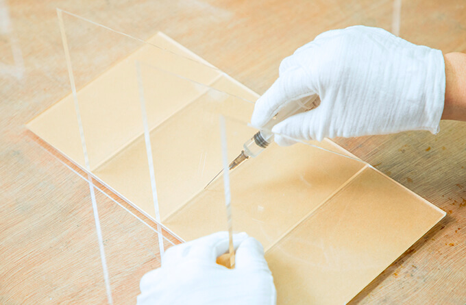 Hand assembly of acrylic displays